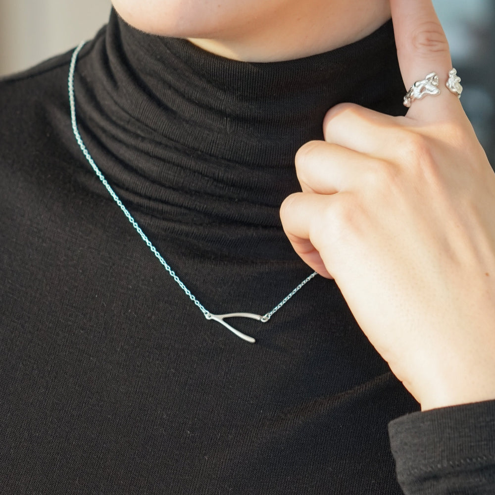 Silver lucky bone necklace